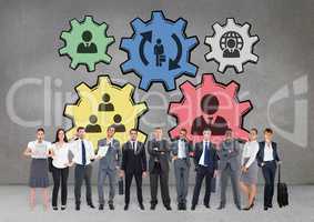 Business people standing against people in cogs graphics against grey background