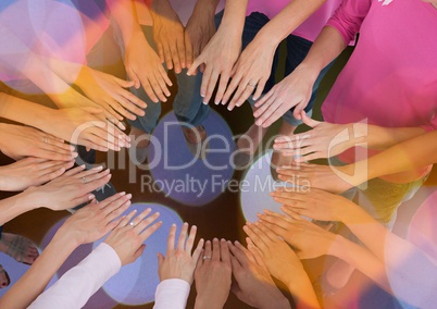 Breast cancer awareness women putting hands together