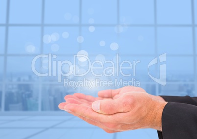 Open hand with blue background