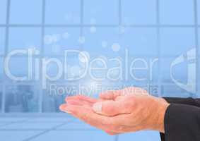 Open hand with blue background