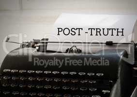 Post-truth text on typewriter