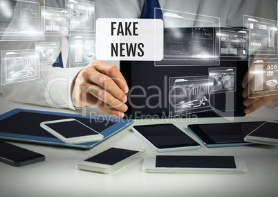 Holding devices with Fake news text and interface