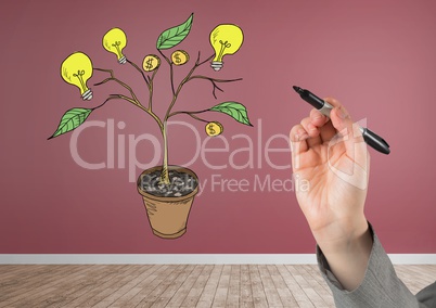 Hand holding pen and Drawing of Money and idea graphics on plant branches on wall