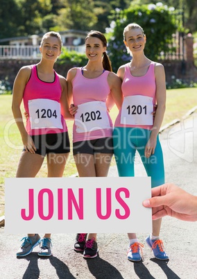 Join us Text and Hand holding card with pink breast cancer awareness women marathon run