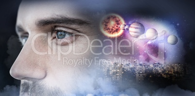 Composite image of man with blue eyes looking away