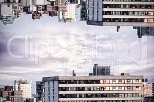 Towers in city against sky