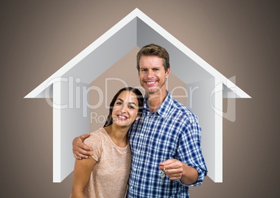 Couple Holding key with house icon in front of vignette