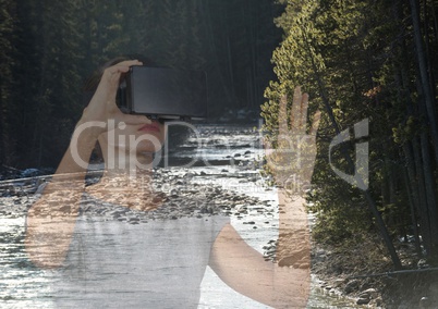 woman with VR glasses forest near the river