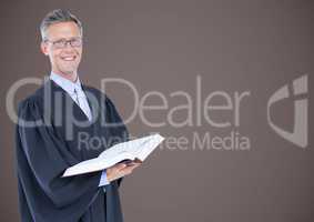 Male judge with open book against brown background