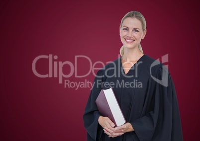 Female judge with book against maroon background