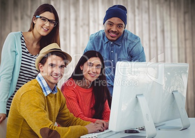 Millennial team against blurry wood panel