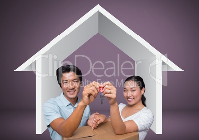 Couple Holding key with house icon and boxes in front of vignette