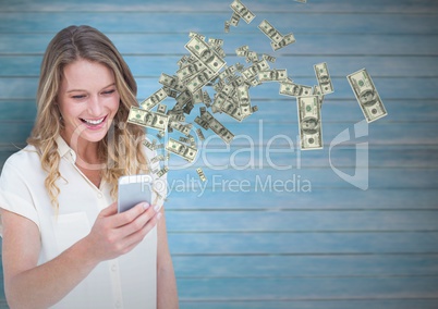 texting money. happy woman with phone,  money coming up from phone.