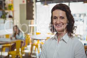 Portrait of smiling woman in cafe