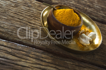 Turmeric powder in plate