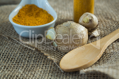 Turmeric powder and ginger on sack