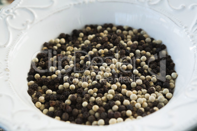 Mix peppercorns in plate