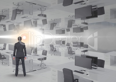 businessman standing in inverted office with flare