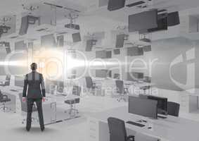 businessman standing in inverted office with flare