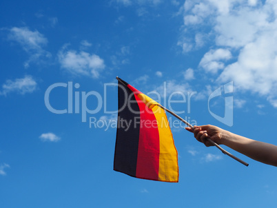 Female hand with the German flag