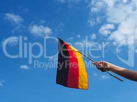 Female hand with the German flag