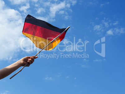 Female hand with the German flag