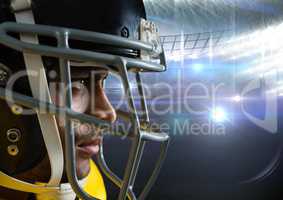 american football  player standing in stadium