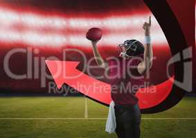 american football  player in stadium cheering with arrow