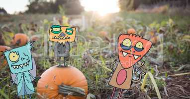 Monster cartoons standing on halloween pumpkin field