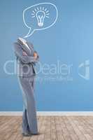 Composite image of headless businesswoman standing with arms crossed