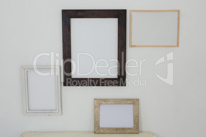Frames hanging on wall