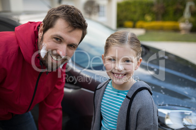 Teenage girl and father having fun