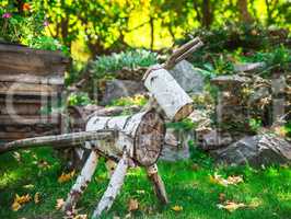 a figure of wood logs in the garden
