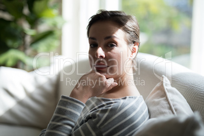 Woman sitting on the coach