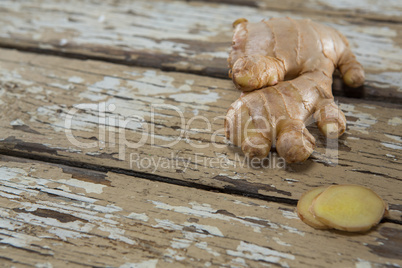 Close up of ginger on weathered table