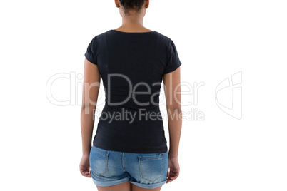 Rear view of woman in hot pants