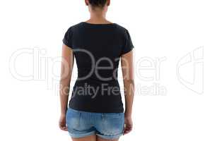 Rear view of woman in hot pants