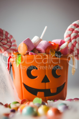 Close up of bucket with various sweet food