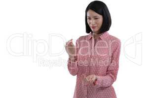 Woman pretending to hold an invisible object