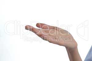 Womans hand pretending to hold an invisible object