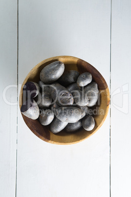 Overhead view of sweet potatoes in bowl on table
