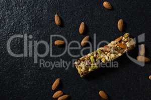 Granola bars with almond on black background