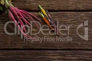 Root vegetables on wooden table