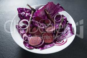 Vegetables in plate on slate