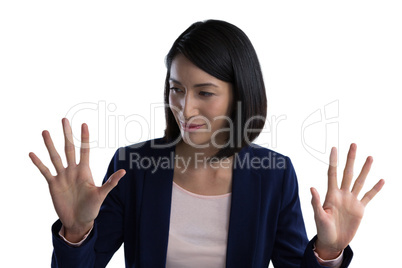 Businesswoman using invisible screen