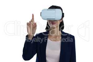 Businesswoman gesturing while using virtual reality headset