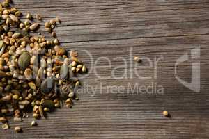 Granola scattered on wooden table