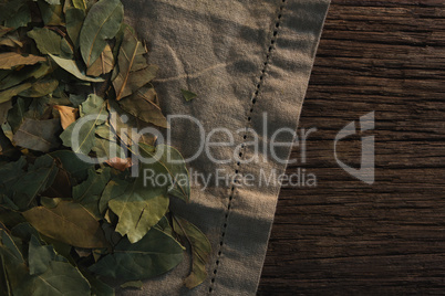 Bay leaf on wooden table