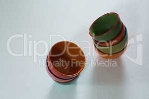 Colorful empty bowls on white background