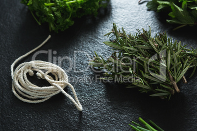 Various type of herbs and rope